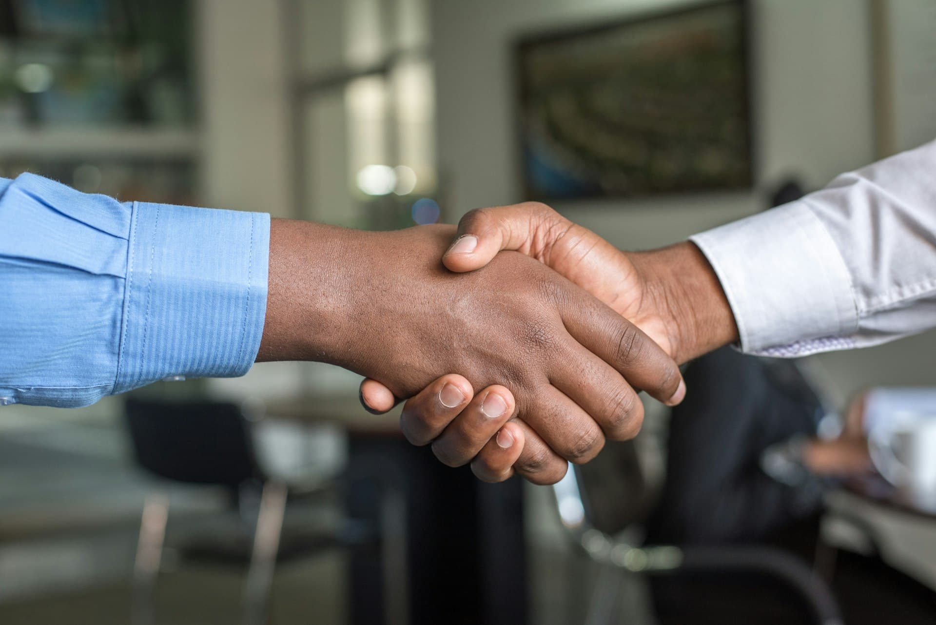 Professional handshake representing connection
