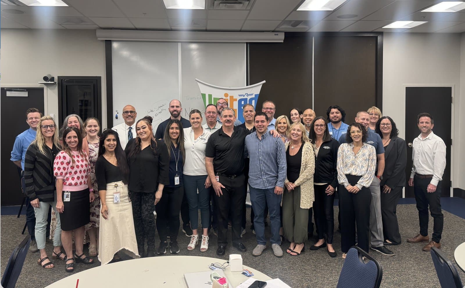 Brett with the America First Credit Union team — Super Ethical Sales & Team Building, August 2026