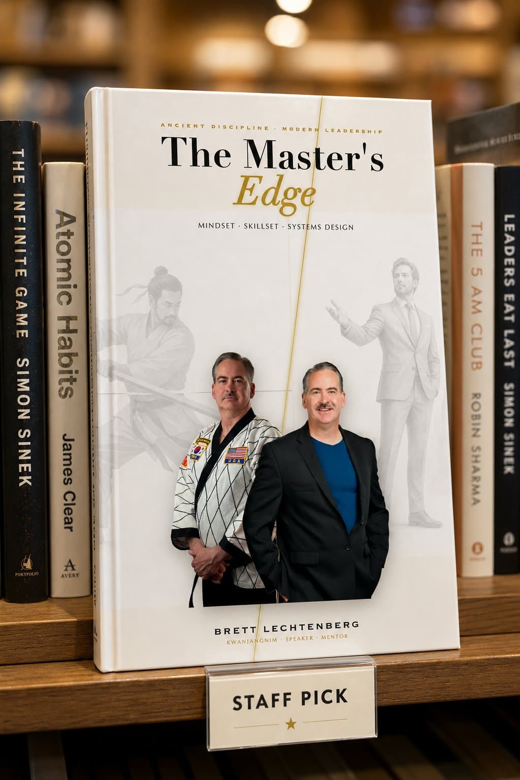 The Master's Edge hardcover on a bookstore shelf as a staff pick